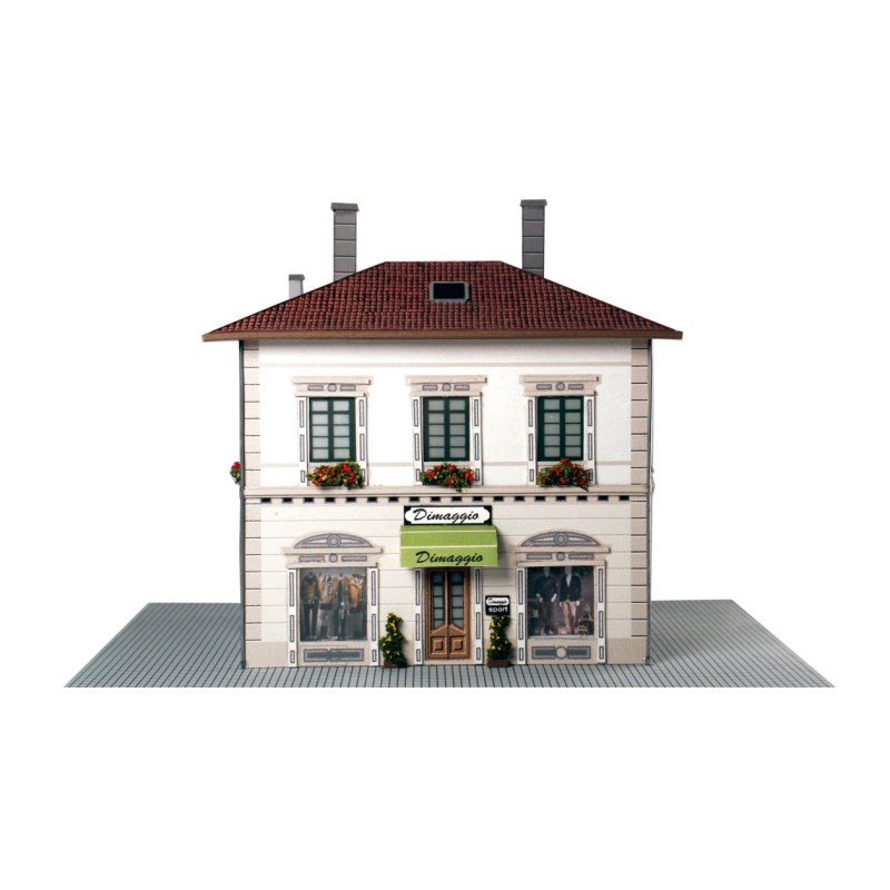 Edificio con piano terra commerciale.