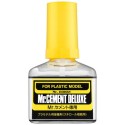Plastic glue MR Cement Deluxe.