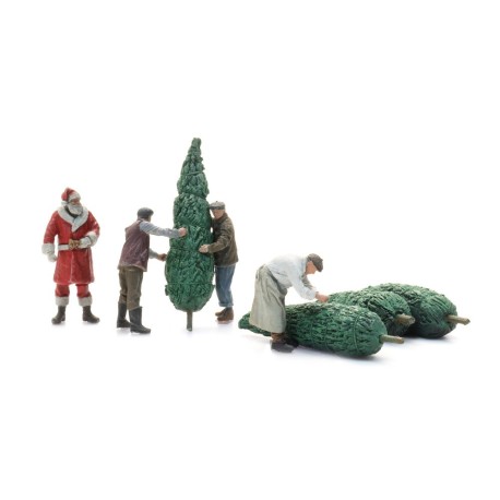 Le Père Noël avec des sapins de Noël.