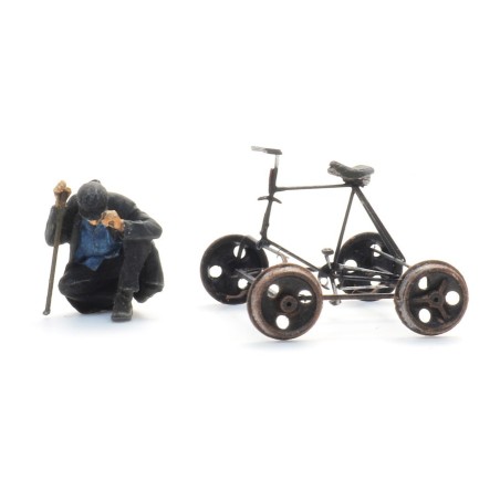 Bicycle draisine and figure.