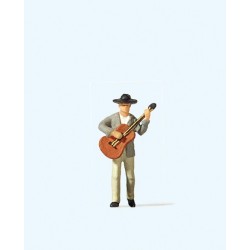 Standing guitar player.