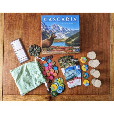 Components of the Cascadia abstract tile-placement board game by Delirium Games.