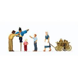 Putting up the scarecrow.
