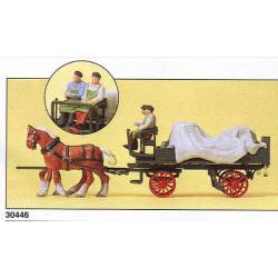 Carro de caballos cargado con bultos.