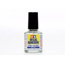 Adesivo para decalques.
