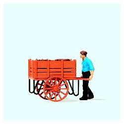 Worker with hand cart.