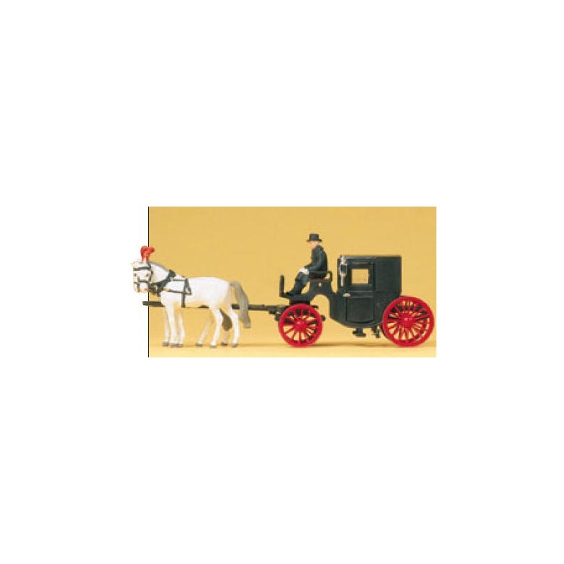Horse drawn black coach.