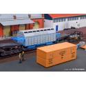 Freight castor container and wooden box.
