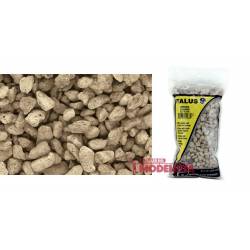 Fragmentos de pedra marrom e grossa.