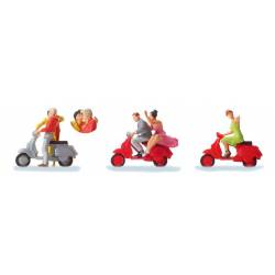 En vespa.