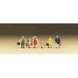 Famiglia con valigie.