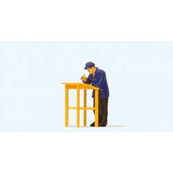 Railway workers at a lectern.