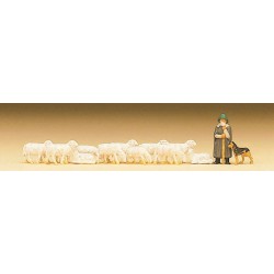 Schäfer mit Hund und Schaf.