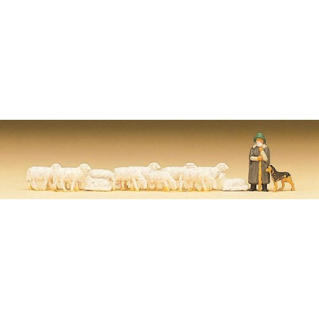 Pastor con perro y ovejas.