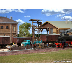 Slag loader with pit.
