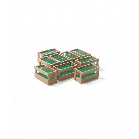 Wooden boxes with green bottles.