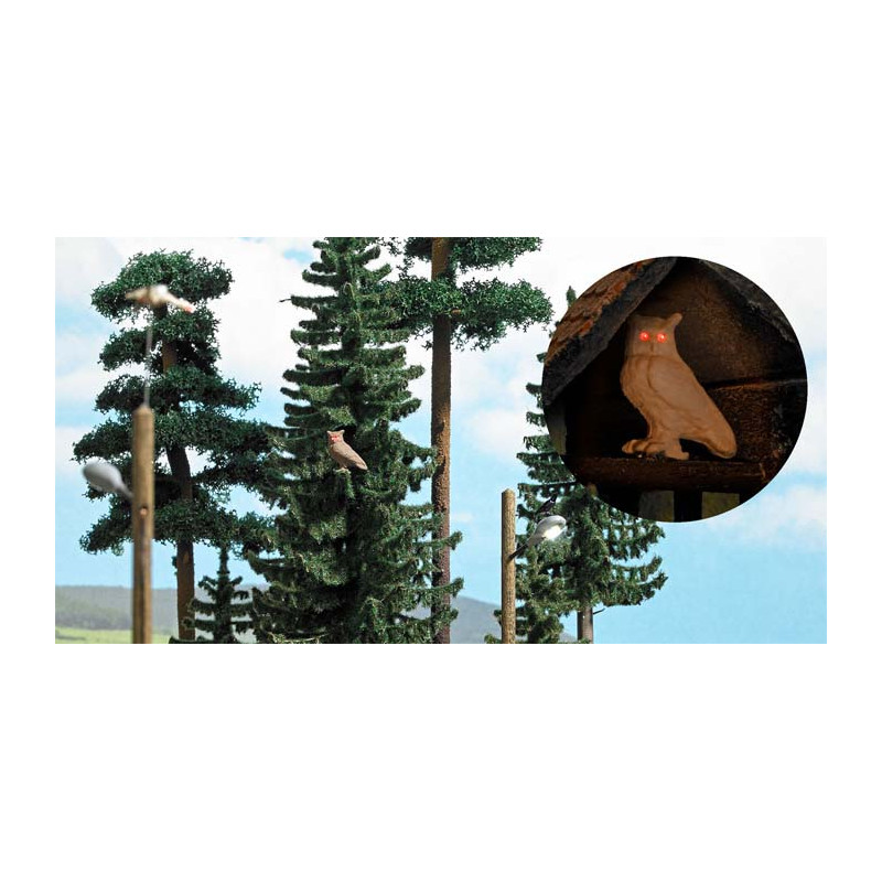 Búho con ojos luminosos.