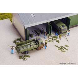 Accessoires pour la réparation de véhicules militaires.