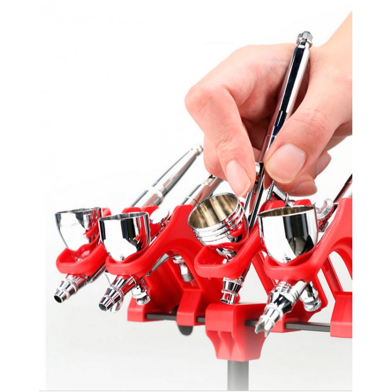 Soporte múltiple para cuatro aerógrafos.