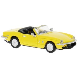 Triumph Spitfire, yellow.